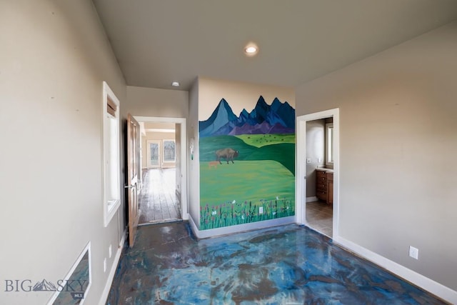 284 Annie Glade, Bozeman, MT 59718 - spare room with baseboards, concrete floors, and recessed lighting