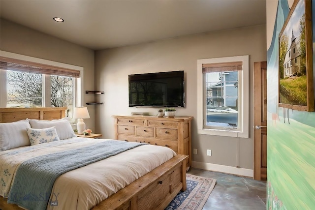 284 Annie Glade, Bozeman, MT 59718 - bedroom featuring baseboards and concrete flooring