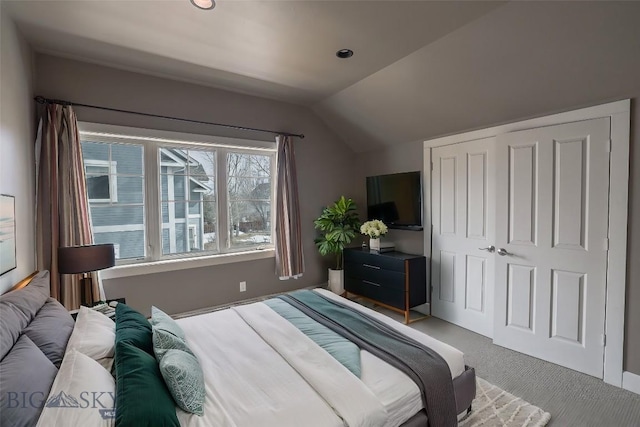 284 Annie Glade, Bozeman, MT 59718 - carpeted bedroom featuring lofted ceiling and a closet