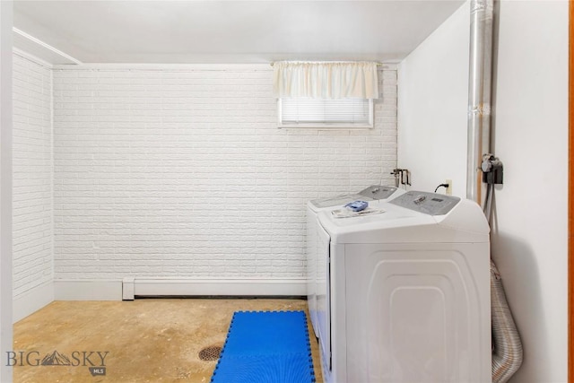 clothes washing area with laundry area and separate washer and dryer