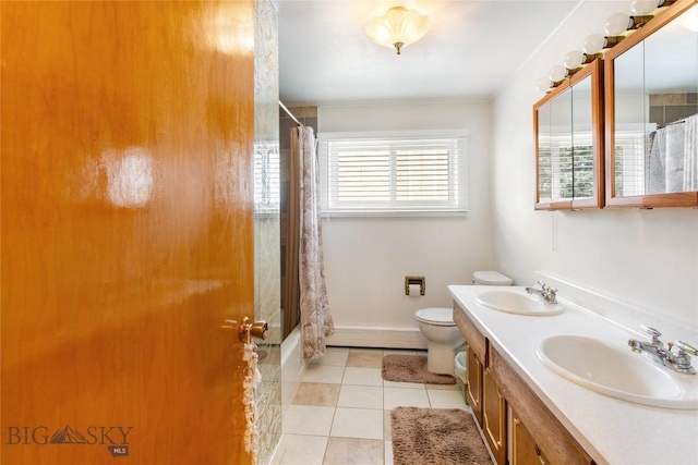 full bath with tile patterned flooring, toilet, baseboard heating, and a sink