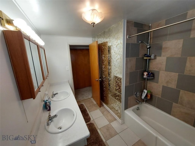 bathroom featuring a sink, double vanity, a bathtub, and tiled shower