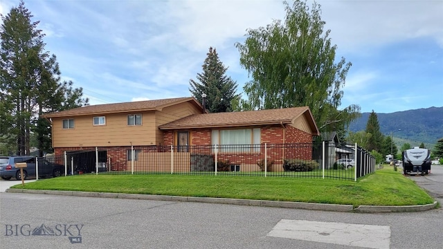 2040 Adams, Butte, MT 59701 - split level home with brick siding and a mountain view