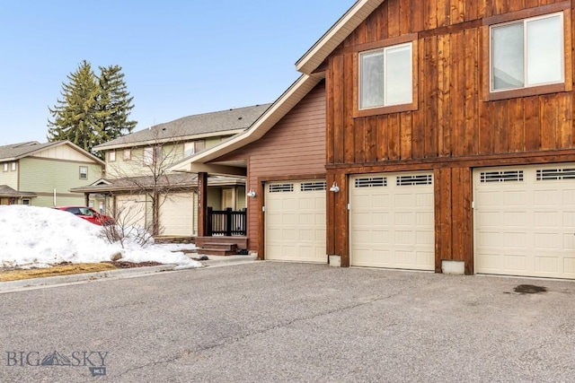 view of front of home with a garage and board and batten siding