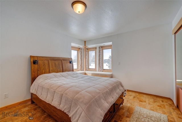 bedroom with baseboards