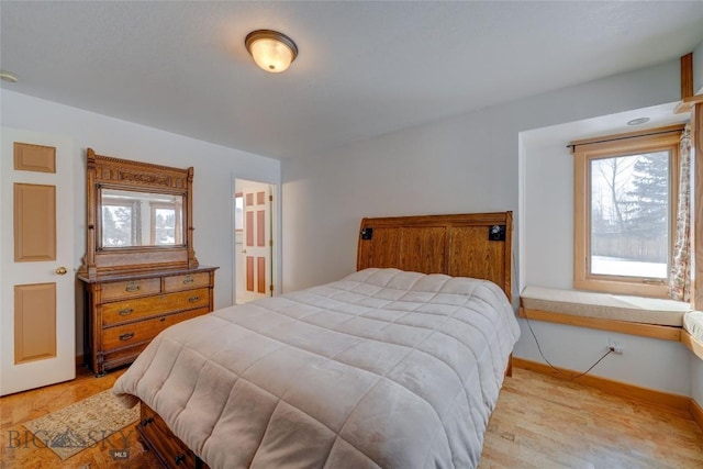 bedroom with baseboards