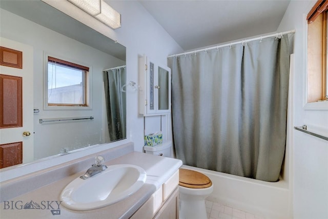 full bathroom with vanity, toilet, and shower / bath combo