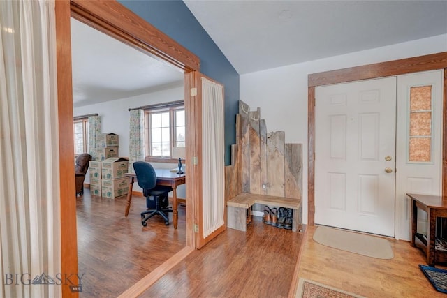 entryway with wood finished floors