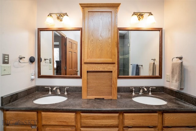 bathroom featuring double vanity and a sink