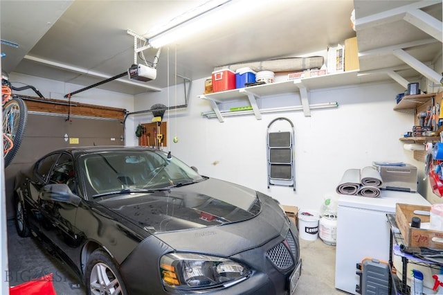 garage featuring a garage door opener