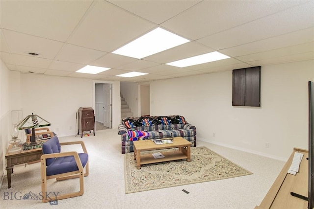 playroom featuring a drop ceiling, baseboards, and carpet floors