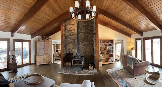 unfurnished living room with high vaulted ceiling, a wood stove, hardwood / wood-style flooring, french doors, and beamed ceiling