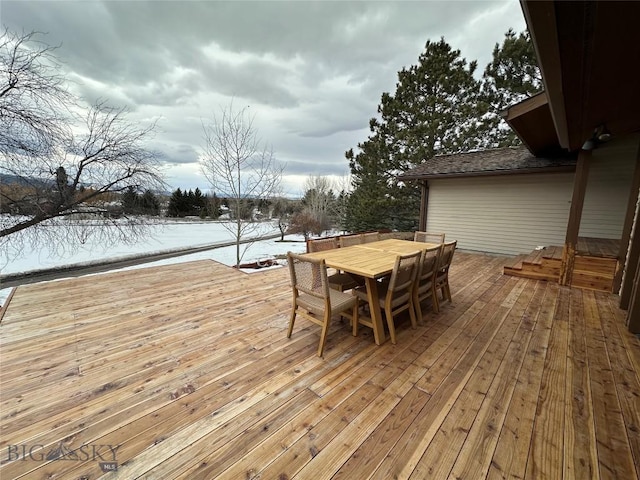 deck featuring outdoor dining area