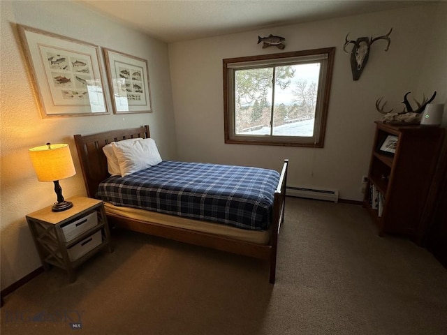 carpeted bedroom with a baseboard heating unit