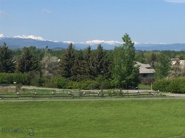 mountain view featuring a rural view