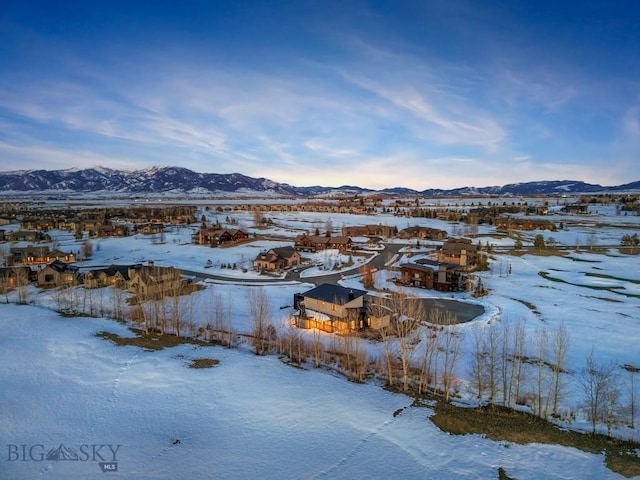 33 Leachman Ln, Bozeman, MT 59718 - snowy aerial view featuring a mountain view