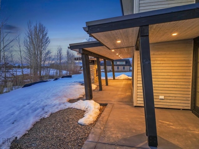 view of snow covered patio