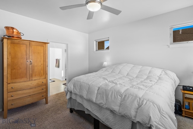 2465 Lasso Ave, Bozeman, MT 59718 - carpeted bedroom with a ceiling fan and ensuite bathroom