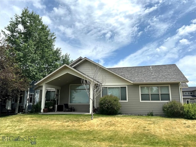 2465 Lasso Ave, Bozeman, MT 59718 - back of house featuring a patio, a yard, and a shingled roof