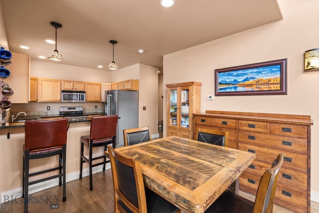2236 Gallatin Green Blvd Unit C, Bozeman, MT 59718 - dining room with recessed lighting, dark wood-style flooring, and baseboards