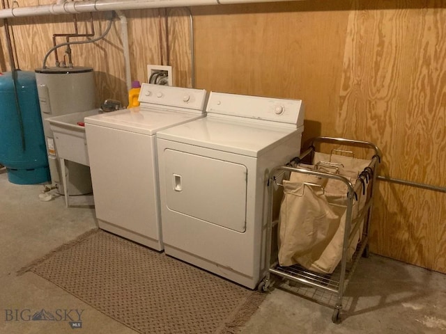 36 Rowdy Way, Ennis, MT 59729 - laundry room featuring separate washer and dryer and water heater