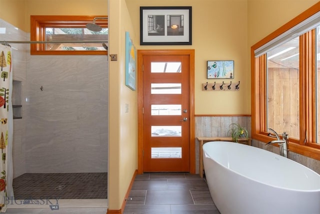 175 Vandyke Rd, Bozeman, MT 59718 - full bath featuring a tile shower, a freestanding bath, and tile patterned flooring