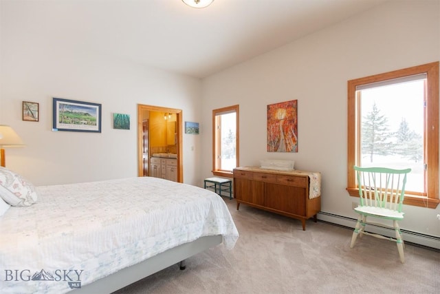 175 Vandyke Rd, Bozeman, MT 59718 - bedroom with multiple windows, light carpet, and baseboard heating
