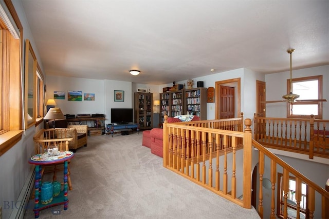 175 Vandyke Rd, Bozeman, MT 59718 - living room featuring carpet floors and a baseboard radiator