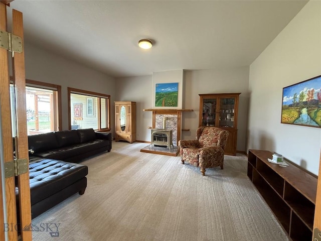 175 Vandyke Rd, Bozeman, MT 59718 - living area with light carpet and a wood stove