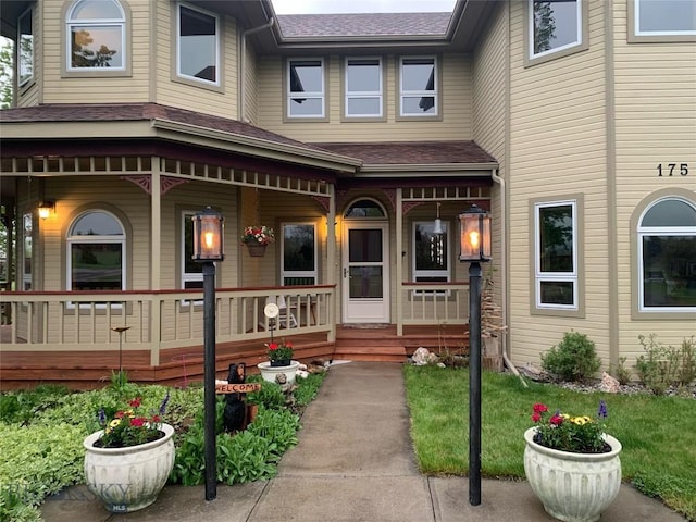 175 Vandyke Rd, Bozeman, MT 59718 - view of exterior entry featuring a porch and a shingled roof
