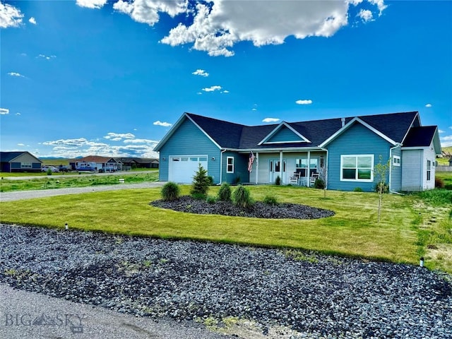 42 Wild Rye Pl, Three Forks, MT 59752 - single story home with a garage, driveway, a front lawn, and covered porch