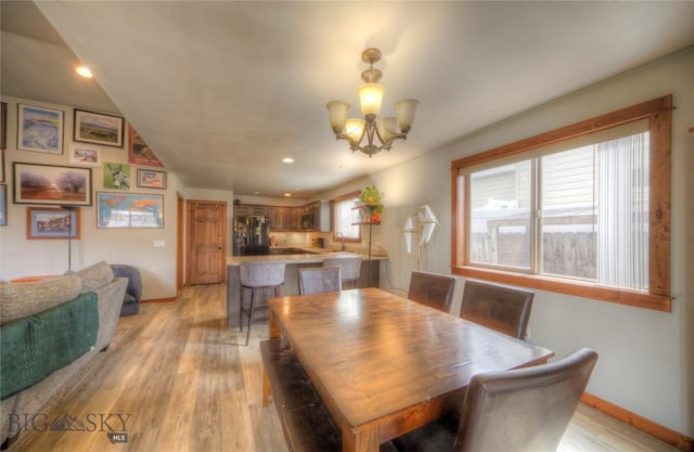 813 Pleiades Pl, Livingston, MT 59047 - dining area with light wood finished floors, an inviting chandelier, baseboards, and recessed lighting
