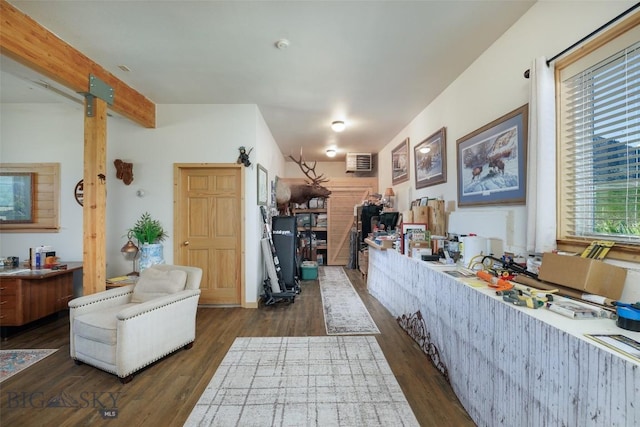 37 Bridger Meadow Ln, Emigrant, MT 59065 - living room featuring dark wood-type flooring, beam ceiling, and a wall mounted AC