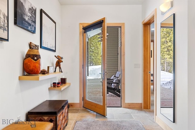214 W Pine Cone Ter, Big Sky, MT 59716 - entrance foyer featuring french doors and baseboards