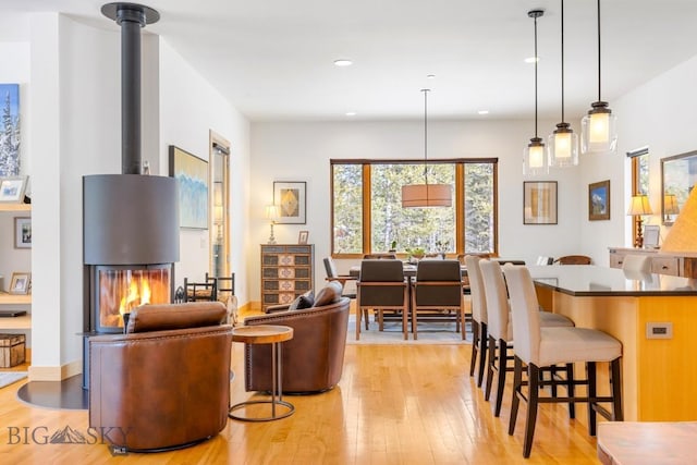 214 W Pine Cone Ter, Big Sky, MT 59716 - living room featuring light wood finished floors and recessed lighting