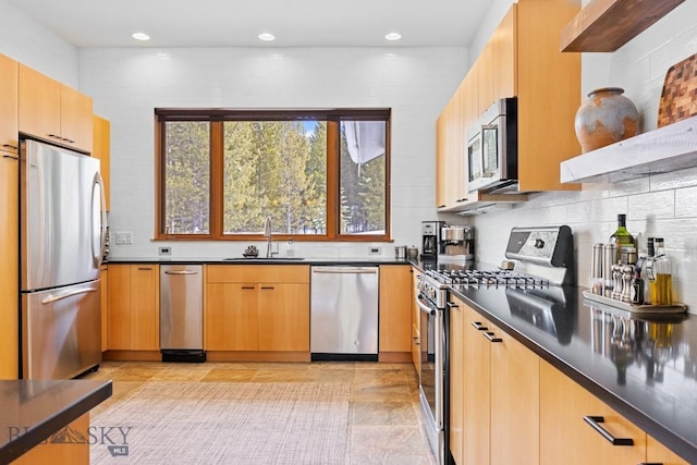 214 W Pine Cone Ter, Big Sky, MT 59716 - kitchen featuring appliances with stainless steel finishes, dark countertops, backsplash, recessed lighting, and open shelves