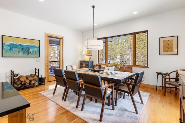 214 W Pine Cone Ter, Big Sky, MT 59716 - dining space with healthy amount of natural light, light wood-type flooring, and recessed lighting