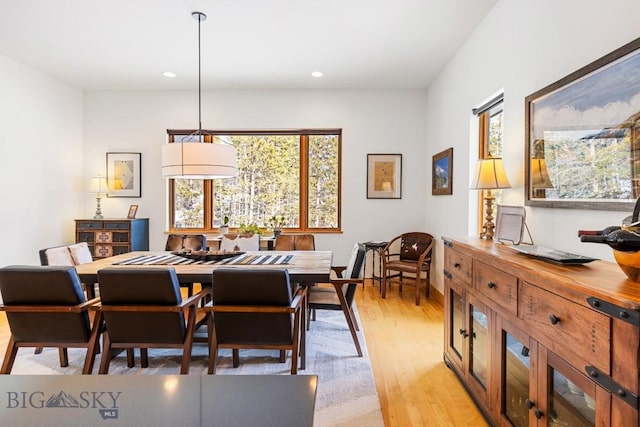214 W Pine Cone Ter, Big Sky, MT 59716 - dining area with light wood-style floors, healthy amount of natural light, and recessed lighting