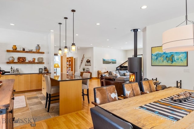 214 W Pine Cone Ter, Big Sky, MT 59716 - dining space with recessed lighting and light wood-style flooring