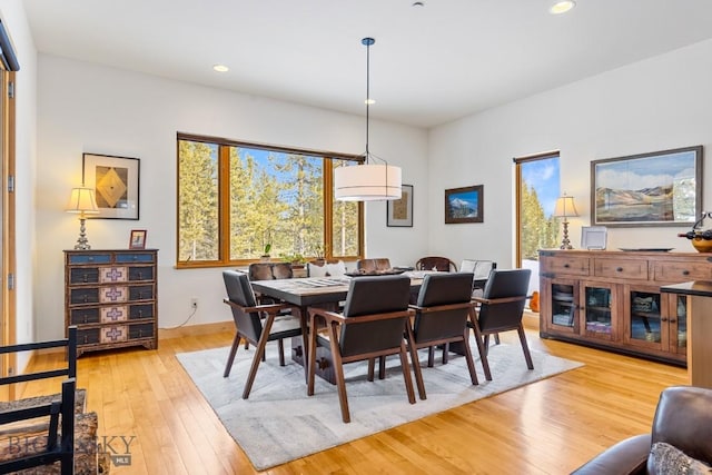 214 W Pine Cone Ter, Big Sky, MT 59716 - dining area with light wood-style floors and recessed lighting