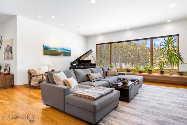 214 W Pine Cone Ter, Big Sky, MT 59716 - living room featuring light wood-type flooring and recessed lighting