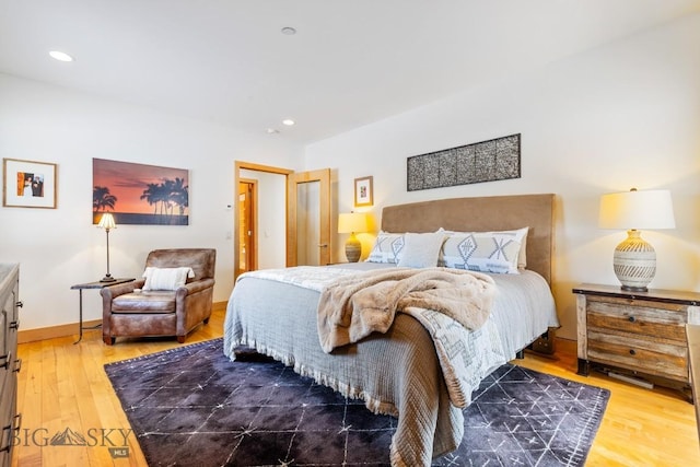 214 W Pine Cone Ter, Big Sky, MT 59716 - bedroom featuring wood finished floors and recessed lighting