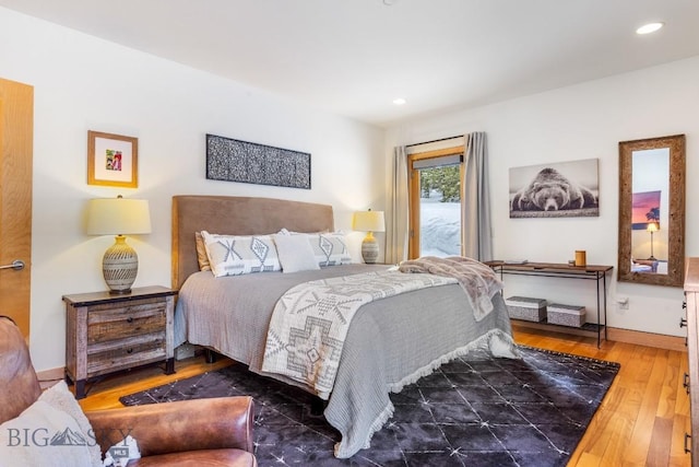 214 W Pine Cone Ter, Big Sky, MT 59716 - bedroom with wood-type flooring and recessed lighting
