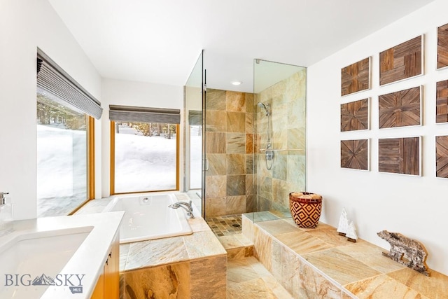 214 W Pine Cone Ter, Big Sky, MT 59716 - bathroom with a garden tub, a walk in shower, vanity, and recessed lighting