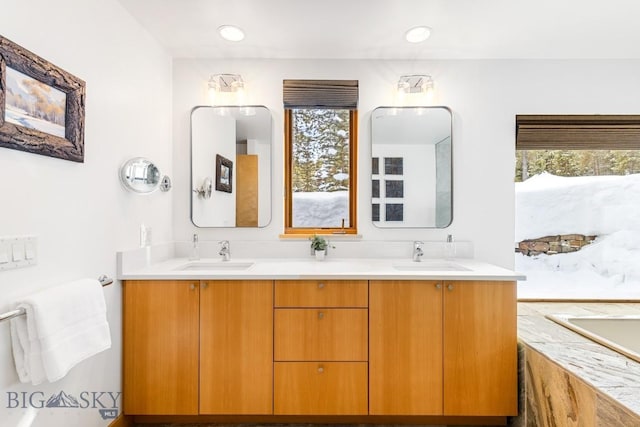 214 W Pine Cone Ter, Big Sky, MT 59716 - bathroom with plenty of natural light and double vanity