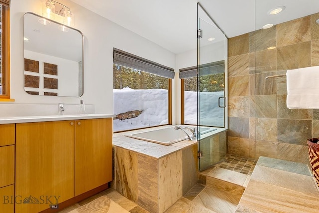214 W Pine Cone Ter, Big Sky, MT 59716 - bathroom with a shower stall, a garden tub, and vanity