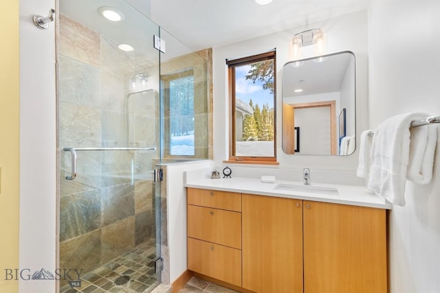 214 W Pine Cone Ter, Big Sky, MT 59716 - bathroom with vanity and a shower stall
