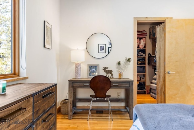 214 W Pine Cone Ter, Big Sky, MT 59716 - bedroom with light wood-style floors