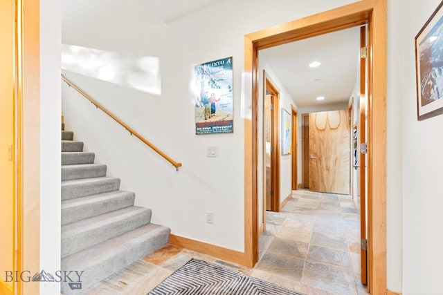 214 W Pine Cone Ter, Big Sky, MT 59716 - stairs featuring stone finish floors and recessed lighting
