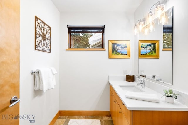 214 W Pine Cone Ter, Big Sky, MT 59716 - bathroom with vanity and baseboards